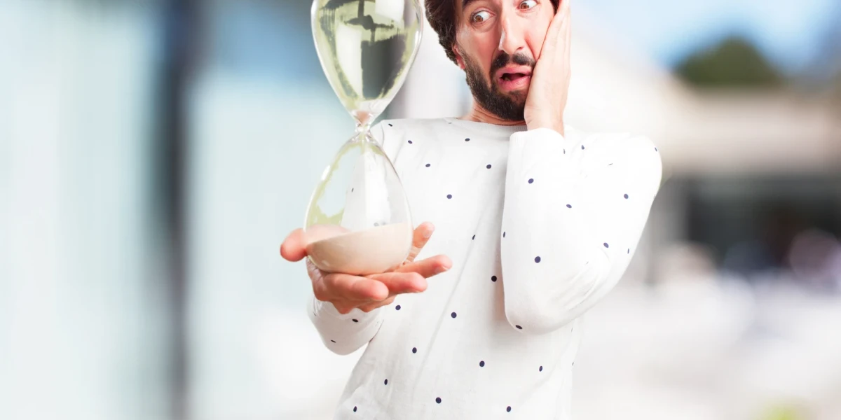young crazy man worried about time