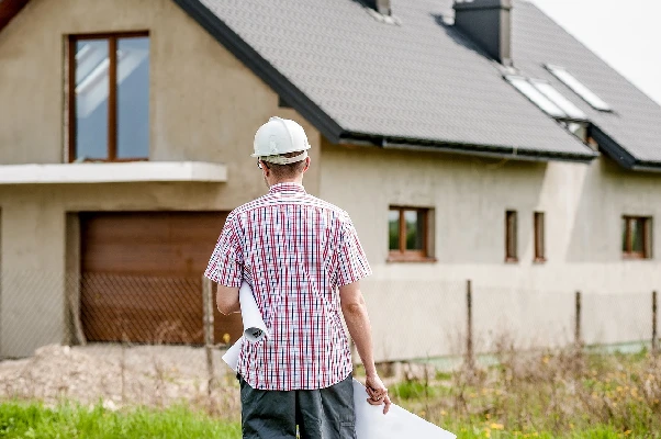 A contractor visits a house where he works