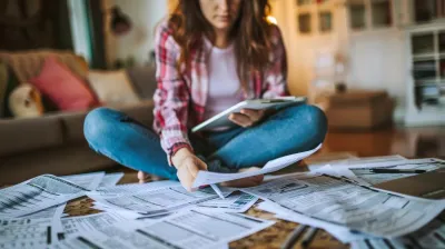 Person checking tax refund status on a smartphone